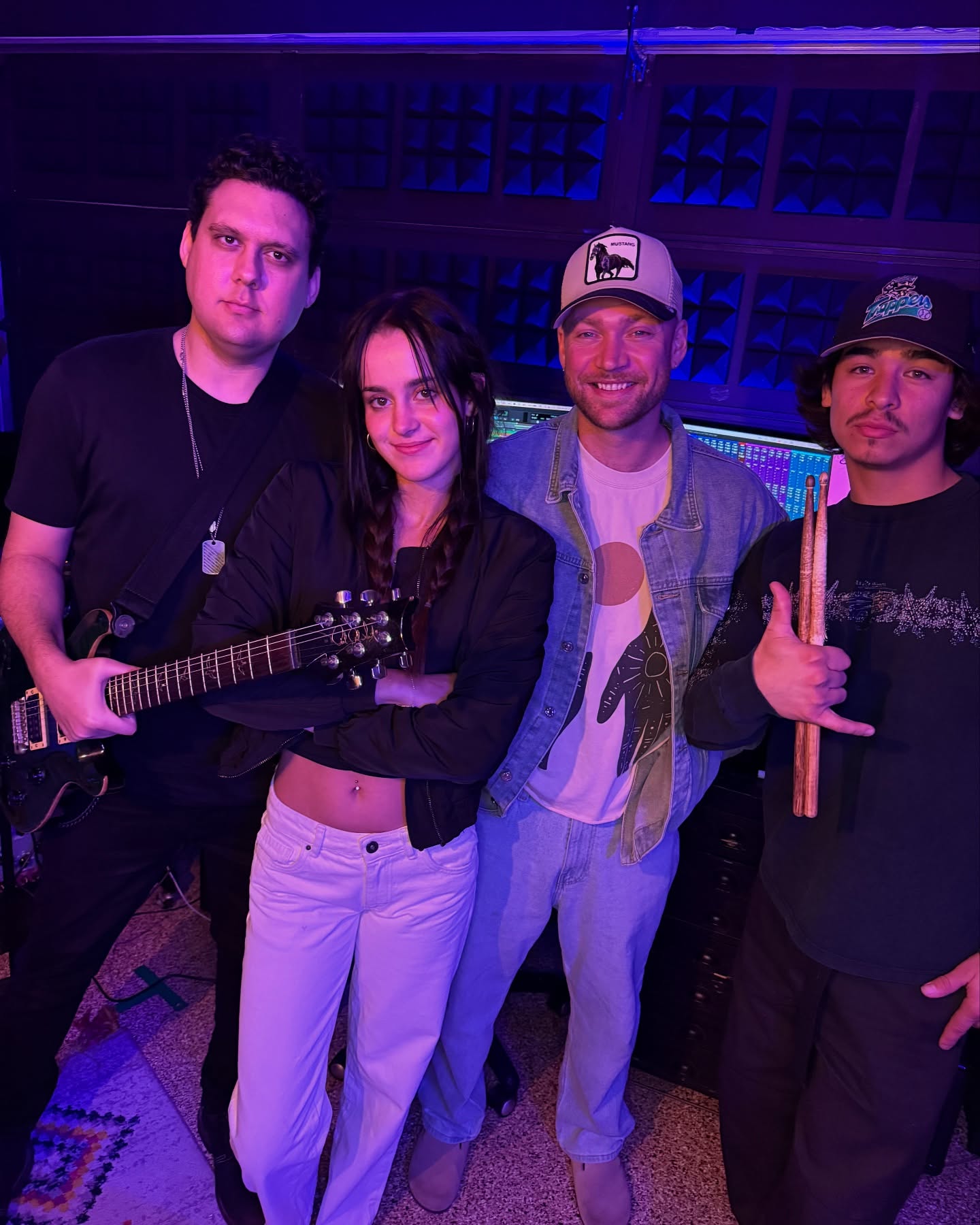 JX-Lynne with her band in the studio
